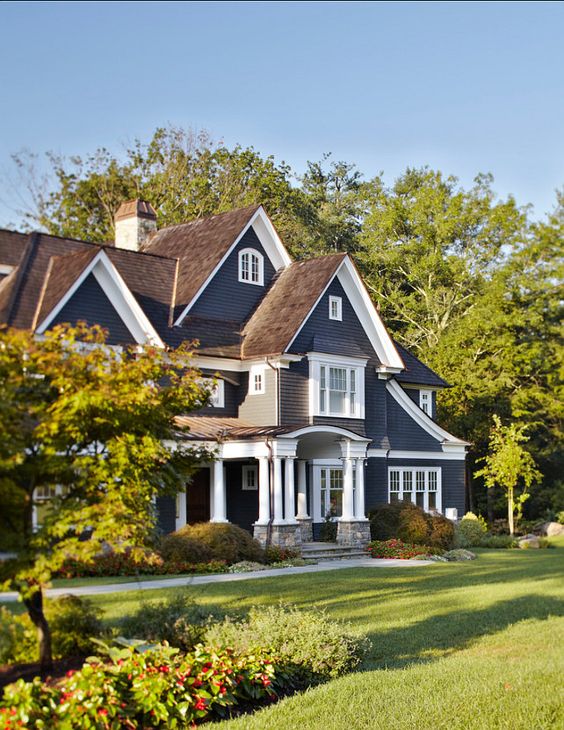 brown roof blue house
