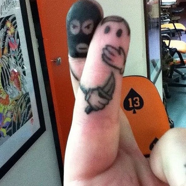  The Kidnap Couple Tattoo on Finger