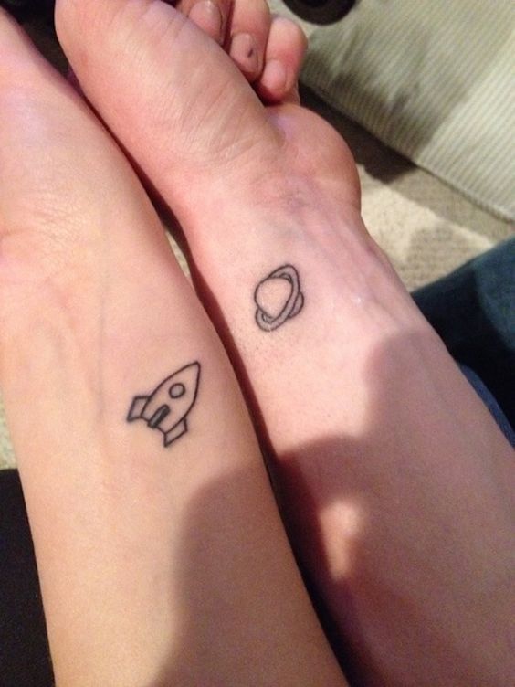 cute tattoo ideas for a couple rocket and saturn