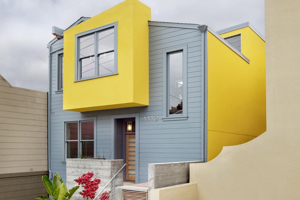 Light grey and yellow house