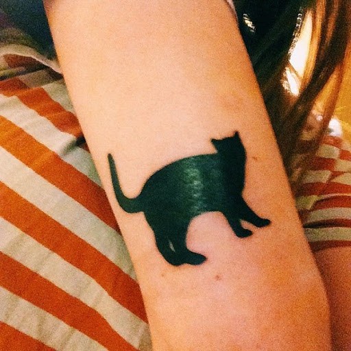 full black cat tattoo