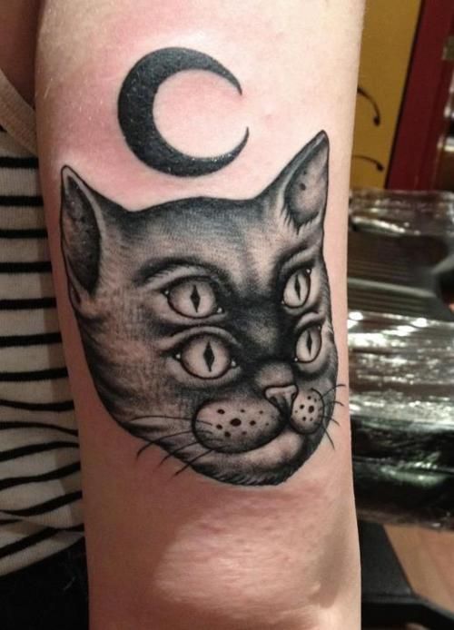 Double Eyed Cat face Tattoo