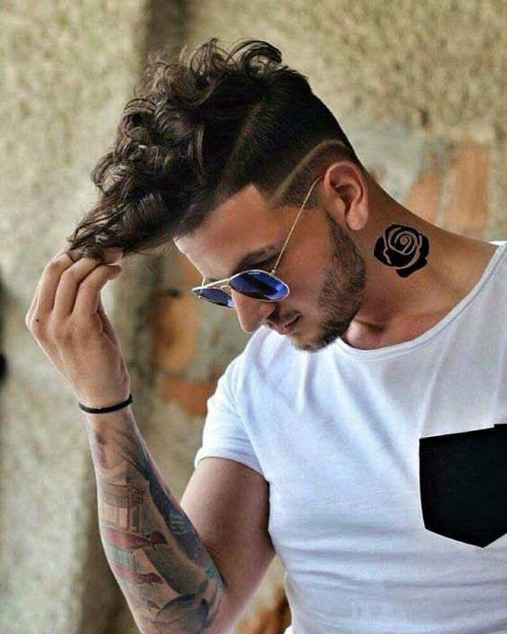 Men Puffy Hairstyles with Taper Fade