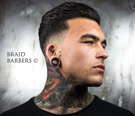 Low Skin Fade Pompadour Men’s Hairstyle