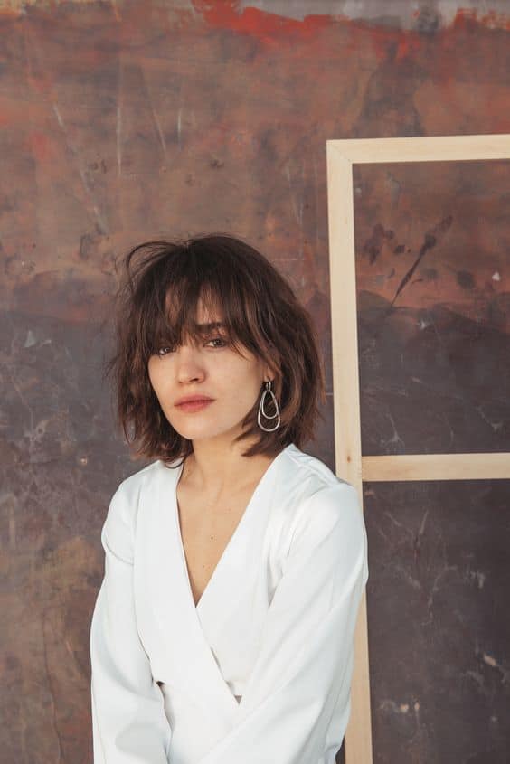 woman over 40 withMessy short hair with bangs