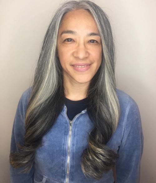 Gray with dark root hairstyle for older woman