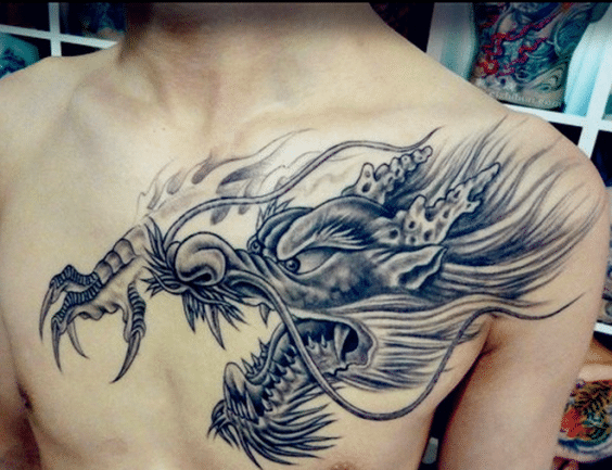 dragon head tattoo for men on chest