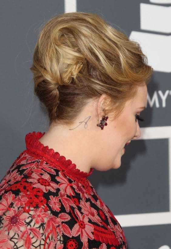 Adele’s tattoo on her neck