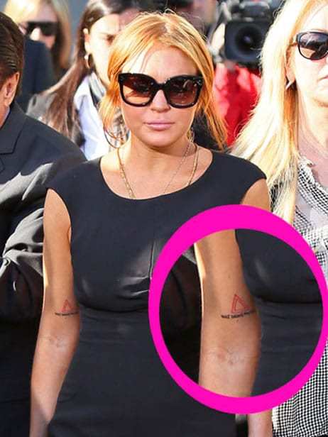 Lindsay Lohan 's Triangle Tattoo on arm