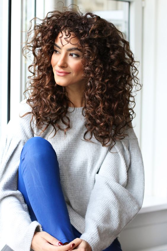Long Hairstyles Bold Color and Tight Curls
