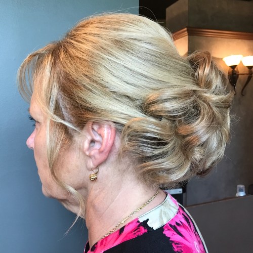 Curled Updo with light Bangs