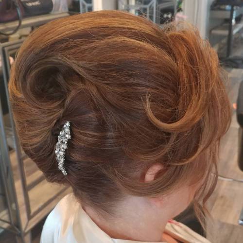 Updo with Sweeping Side Bangs for older woman long hair