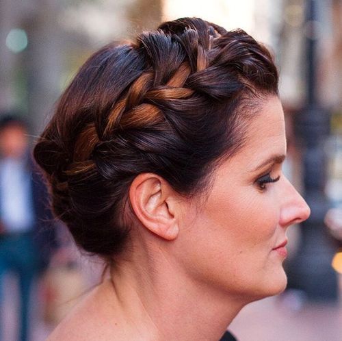 older woman with crown braid hairstyle