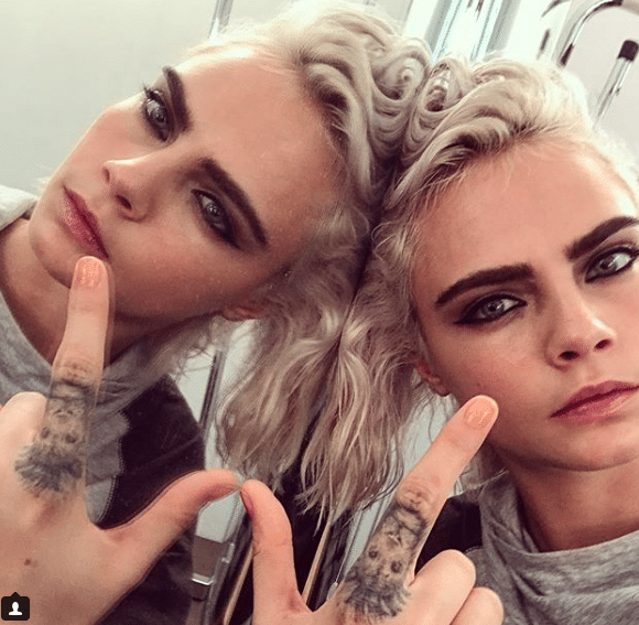 Cara Delevingne Finger tattoo