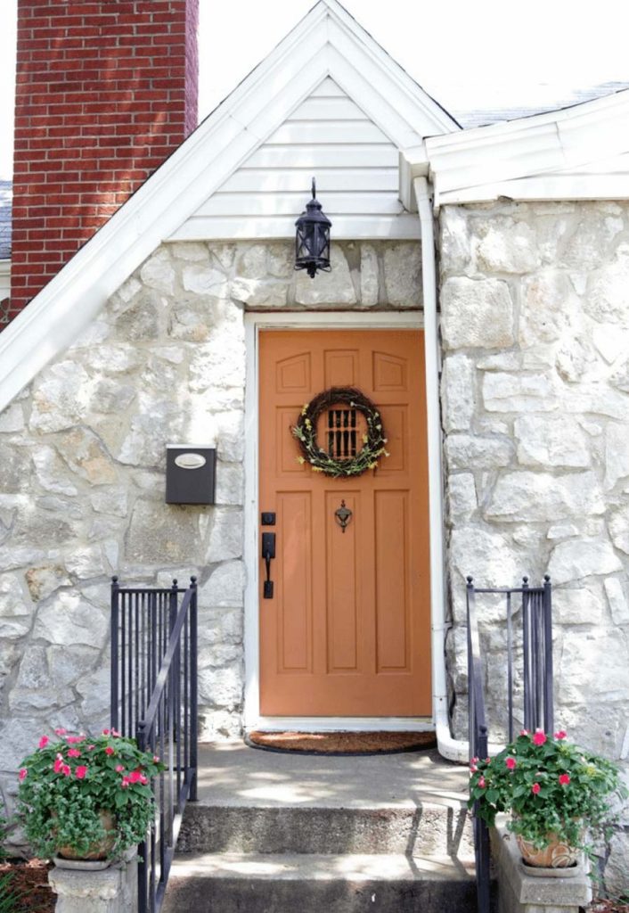 white house with colored door