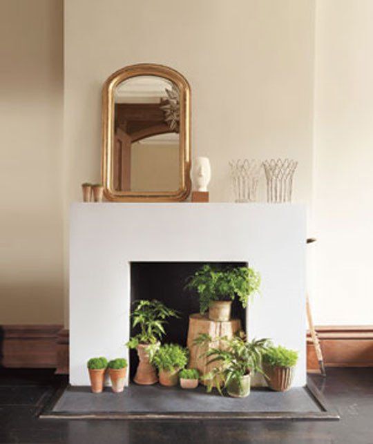 A fresh flower decorated non-working fireplace