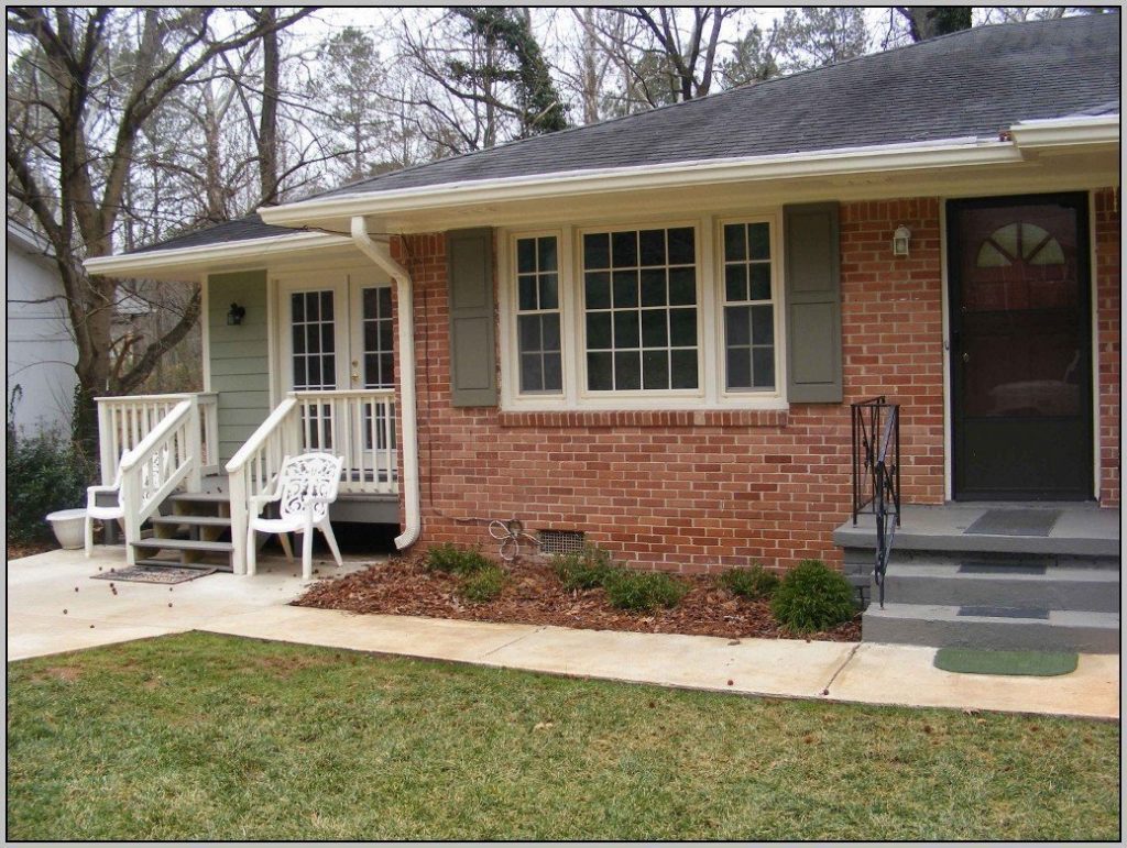 Brick house and combination with pine green exterior color