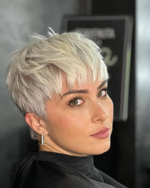 Modern Short Haircut with Wispy Bangs