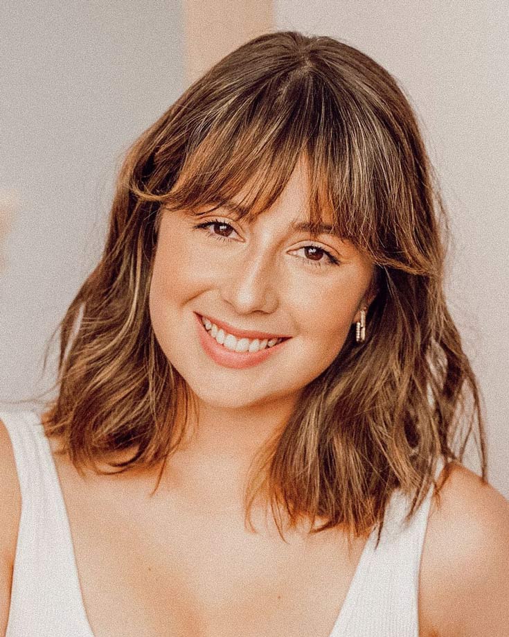 Wispy Bangs Wavy Medium Length Hair