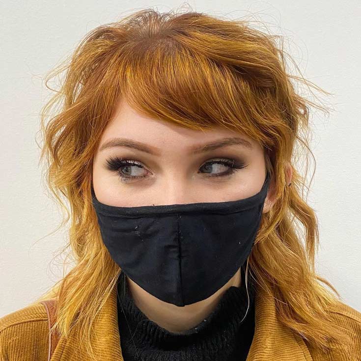Golden Shag Haircut with Side Swept Short Bangs