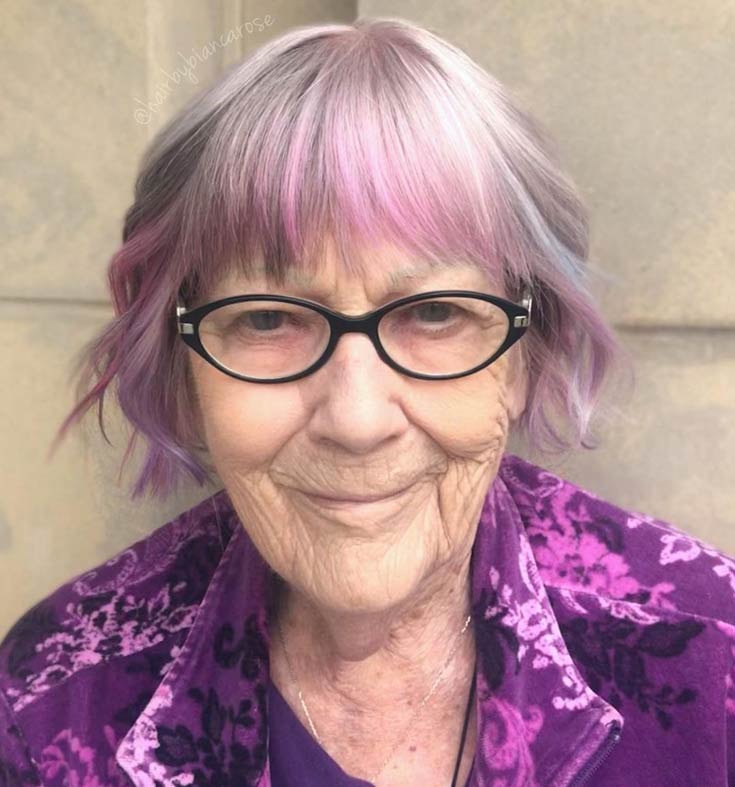 woman at 93 years old with unicorn hairstyles lilac tips by naturally blending into silver roots