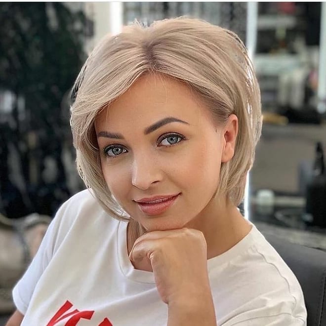 Side Sweeping Bangs With An Angled Bob 