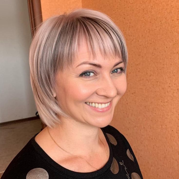 A Short Straight Layered Style with Feathered Bang 
