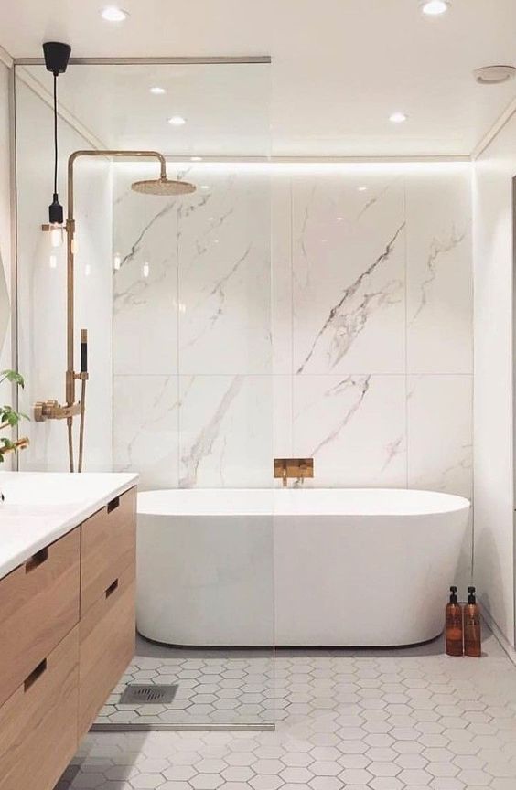Minimalist bathroom with white bathtub