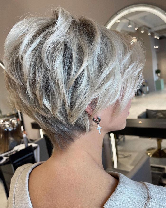 Short Hair and Asymmetrical Feathered Bangs