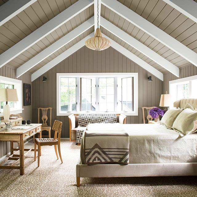 Bedroom with earth tone accent wall combination