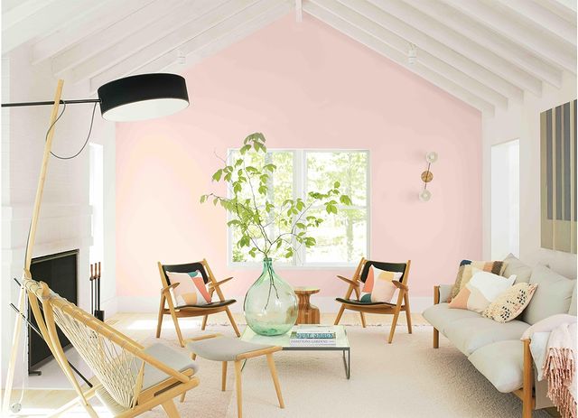 Living room with soft pink accent wall