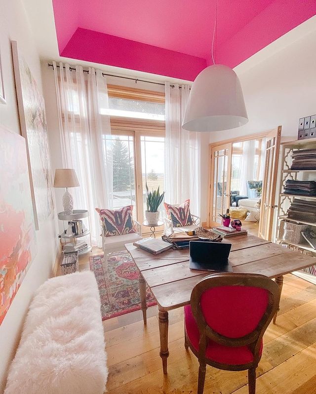 White Living room with rich pink ceiling color