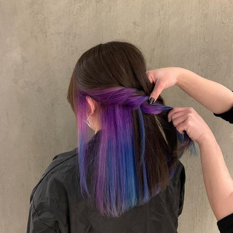 dark brown hair with purple peekaboos