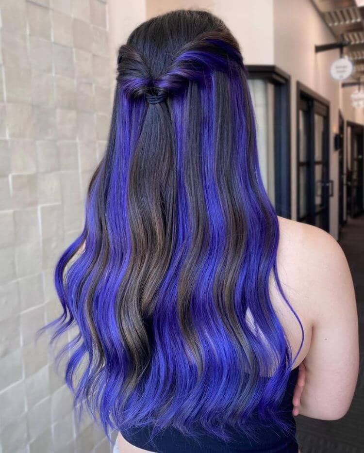 black hair with blue peekaboos.
