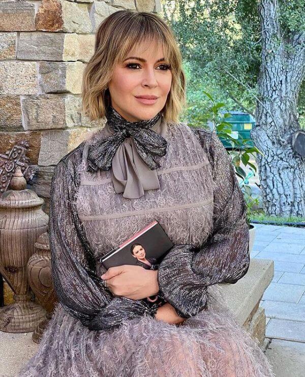ladies hairstyles Chopped Bob with Feathered Bangs