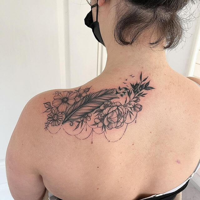 Feather Tattoo on Female Shoulder