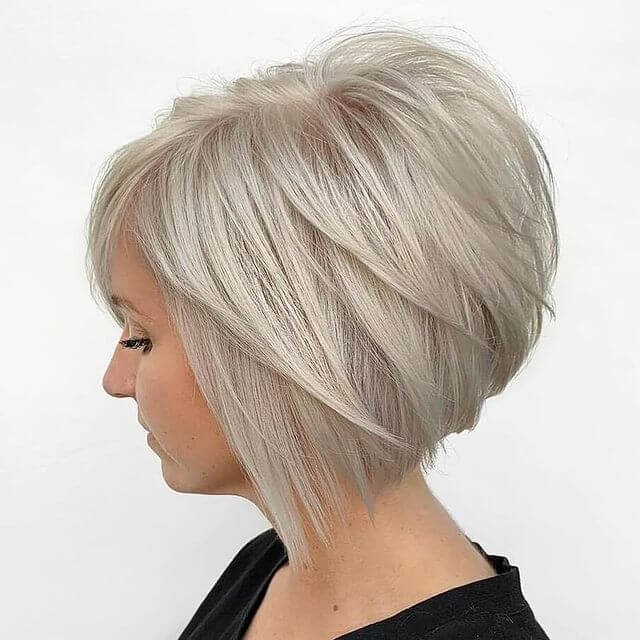Feathered Platinum Blonde Bob