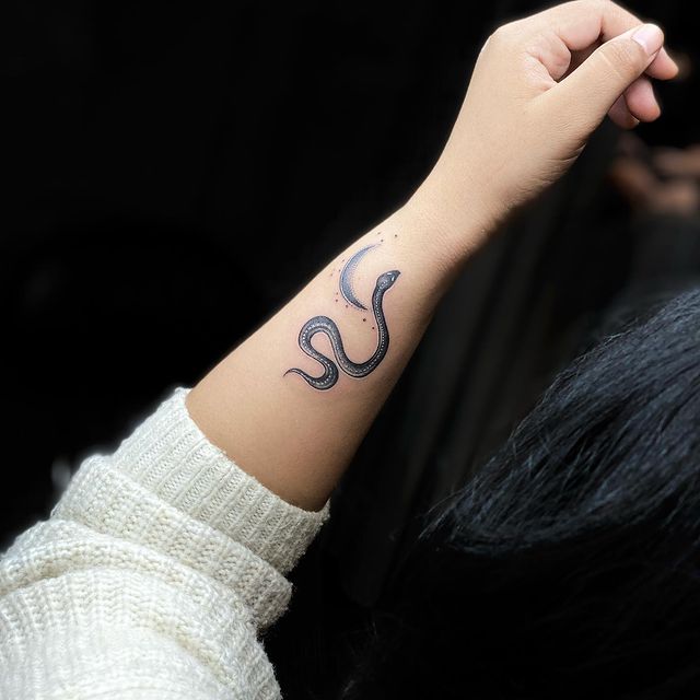 Female Strength Symbol Tattoo