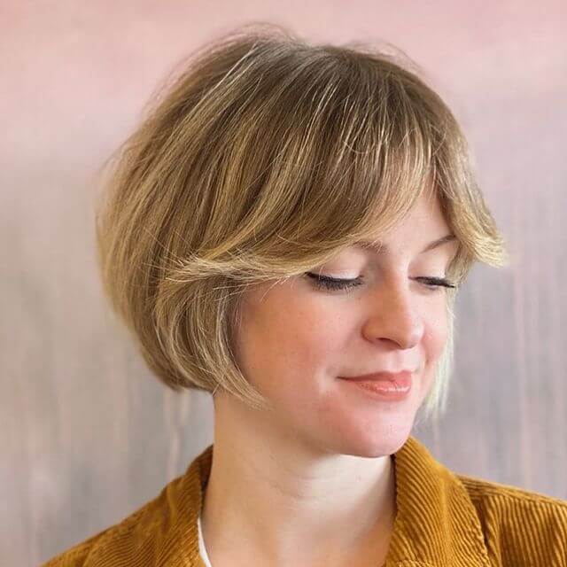 French Bob with Side Swept Feathered Bangs
