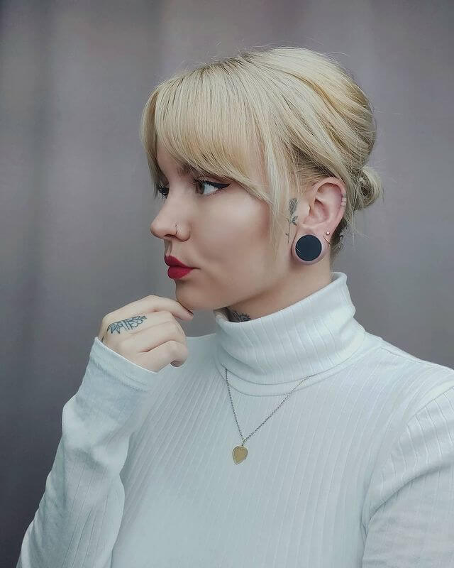 Low Updo with Soft Feather
