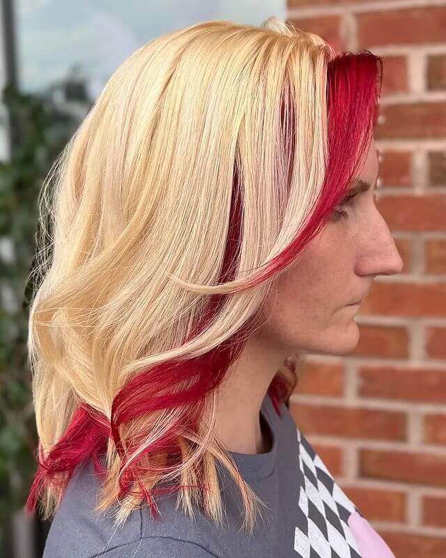 Medium Blonde Hair with Red Underneath Bang