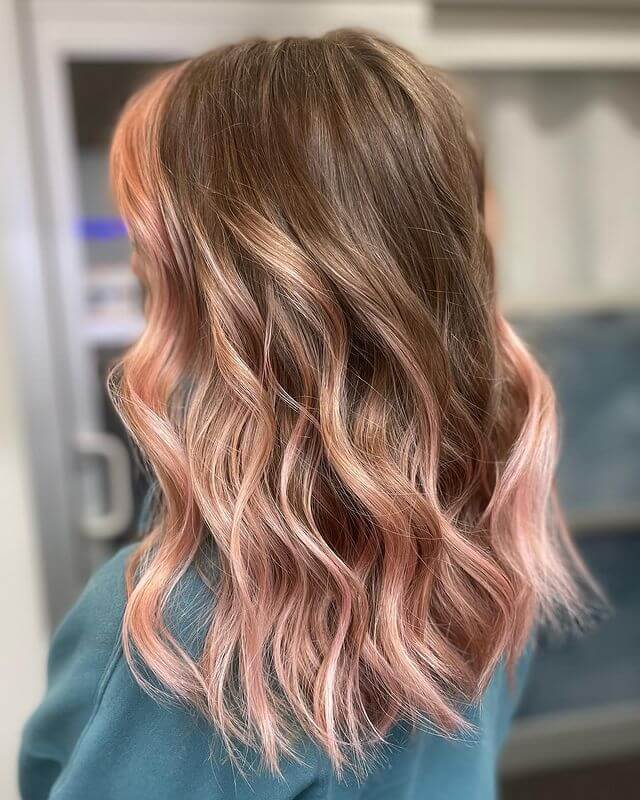Medium Length Blonde Hair with Rose Gold Highlights