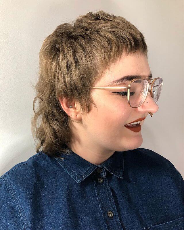 Mullet Haircut with Short Feathered Bang