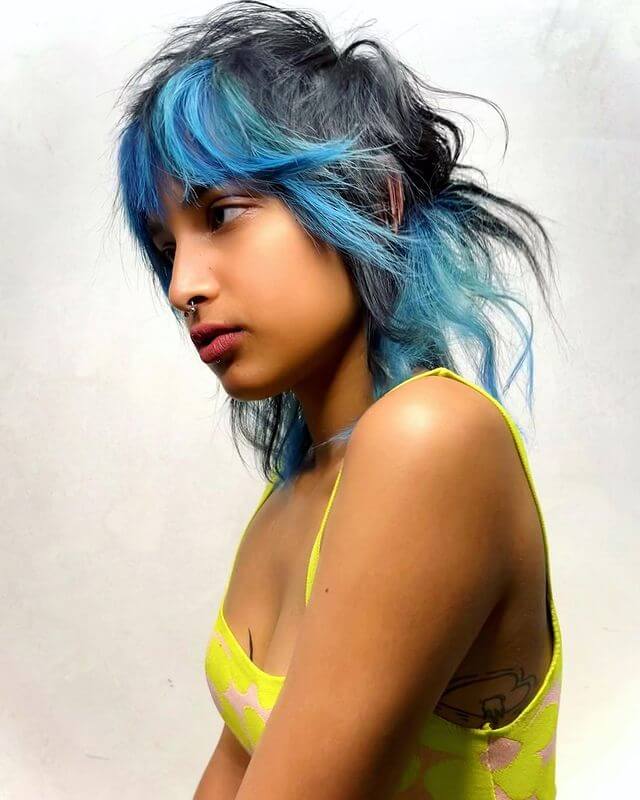 Sci-Fi Movie Inspired Hairstyle with Feathered Bangs