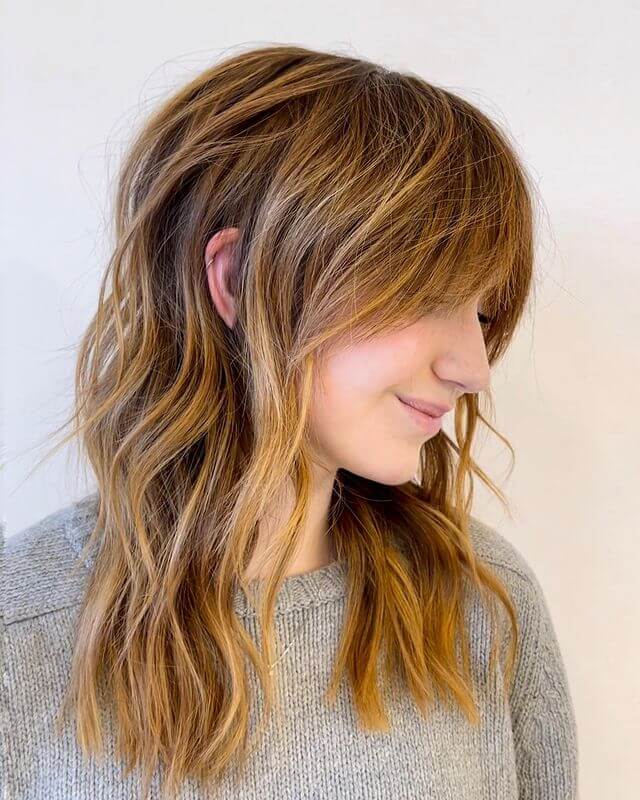 Voluminous Feathered Bang