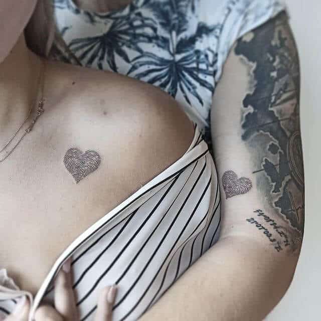 A unique fingerprint heart tattoo A Matching Fingerprint Tattoo