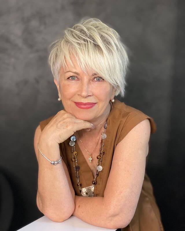 women over 50 Long Pixie with Feathered Bangs