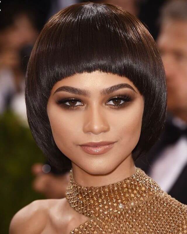 bowl cut with arch bangs