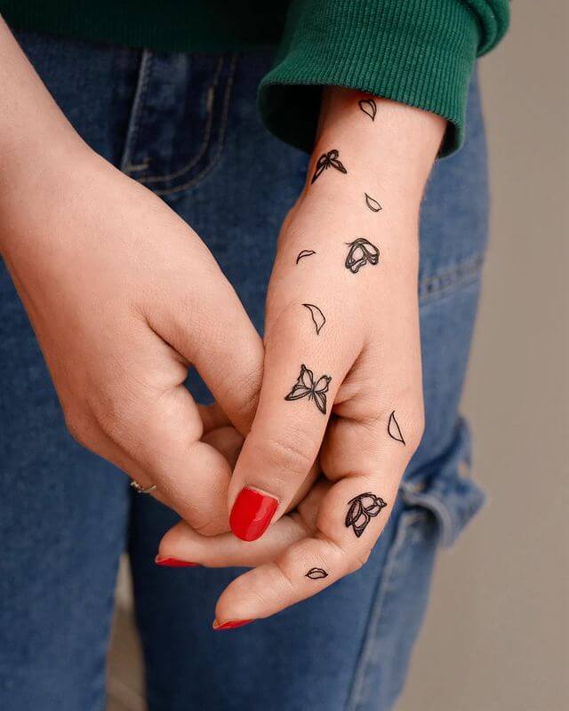 Simple Female Hand Tattoo