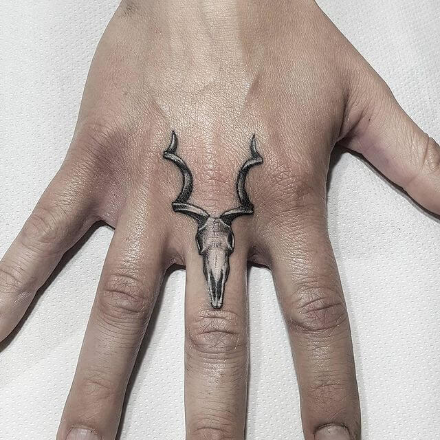 Skeleton Middle Finger Tattoo